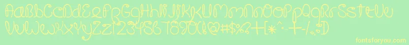 CrushedOutGirlPen Font – Yellow Fonts on Green Background