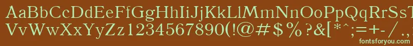 フォントAntiqua110n – 緑色の文字が茶色の背景にあります。