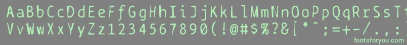 フォントBptypewritedamaged – 灰色の背景に緑のフォント