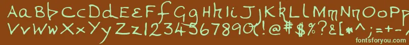 フォントVanessaRegular – 緑色の文字が茶色の背景にあります。