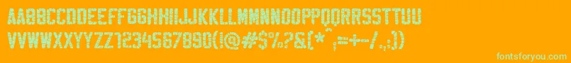 SablonHyperWashed-Schriftart – Grüne Schriften auf orangefarbenem Hintergrund