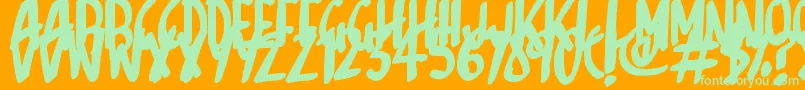 フォントSketchalot – オレンジの背景に緑のフォント