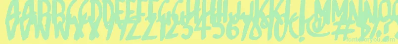 フォントSketchalot – 黄色い背景に緑の文字
