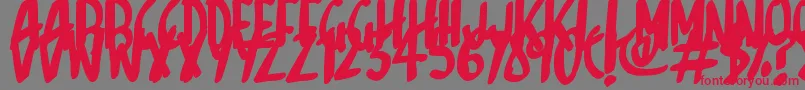 フォントSketchalot – 赤い文字の灰色の背景