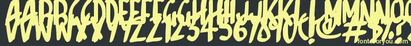 Sketchalot Font – Yellow Fonts on Black Background