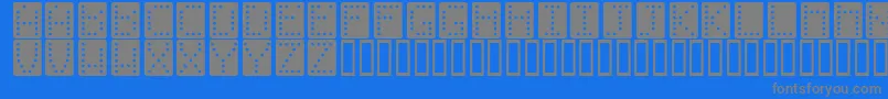 フォントDominoeffectnormal – 青い背景に灰色の文字