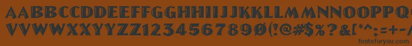 GeLetterCut Font – Black Fonts on Brown Background
