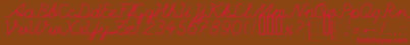 Czcionka HandWritingMutlu – czerwone czcionki na brązowym tle