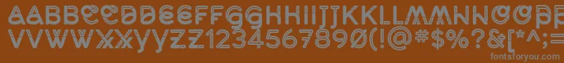 MidcaseBoldline Font – Gray Fonts on Brown Background