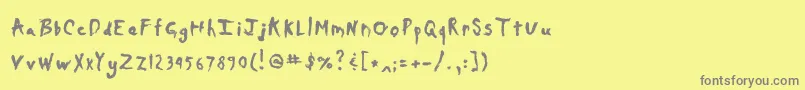 フォントDaubmark – 黄色の背景に灰色の文字