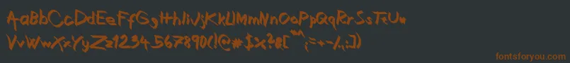 XaligraphyBold-fontti – ruskeat fontit mustalla taustalla