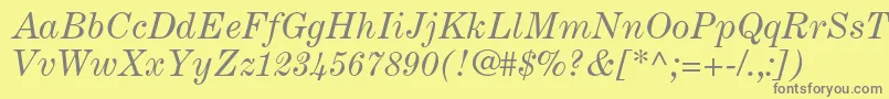 CenturyexpandedltstdItalic-fontti – harmaat kirjasimet keltaisella taustalla