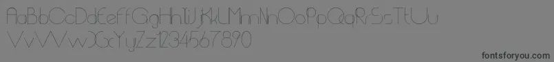 ChempakaRanting-Schriftart – Schwarze Schriften auf grauem Hintergrund