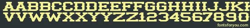 フォントIlliniSpike – 黒い背景に黄色の文字