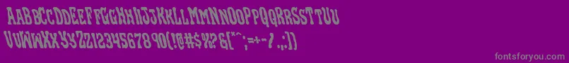 Blackgunkleft-fontti – harmaat kirjasimet violetilla taustalla