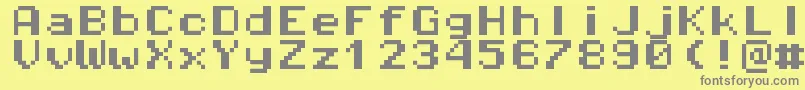 Pixeloperatormonohb8 Font – Gray Fonts on Yellow Background