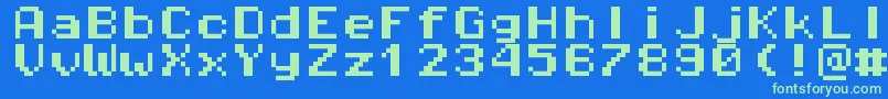 Pixeloperatormonohb8 Font – Green Fonts on Blue Background