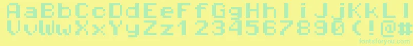 Pixeloperatormonohb8 Font – Green Fonts on Yellow Background