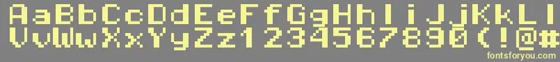 Pixeloperatormonohb8 Font – Yellow Fonts on Gray Background