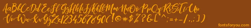 DandeleonVintageDemo Font – Orange Fonts on Brown Background