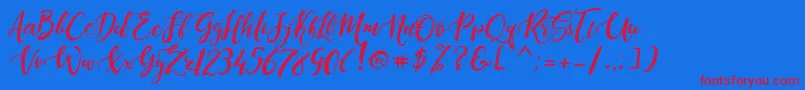 DandeleonVintageDemo-Schriftart – Rote Schriften auf blauem Hintergrund