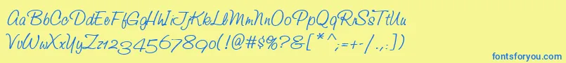 Fonte StudioScriptAltItcTt – fontes azuis em um fundo amarelo