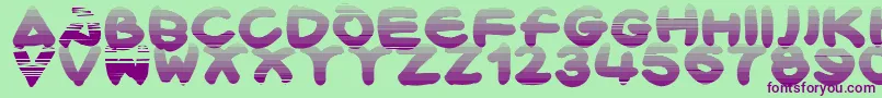 Bloxx Font – Purple Fonts on Green Background