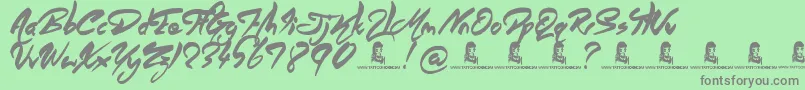 AngelWarriors Font – Gray Fonts on Green Background