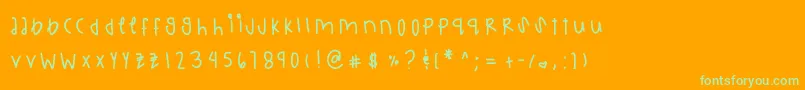 Charminggem-Schriftart – Grüne Schriften auf orangefarbenem Hintergrund