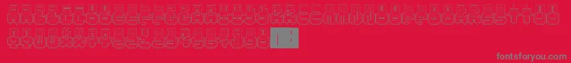 フォントPunchedOut – 赤い背景に灰色の文字