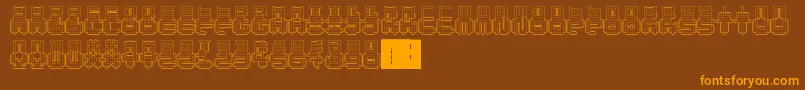 PunchedOut-fontti – oranssit fontit ruskealla taustalla