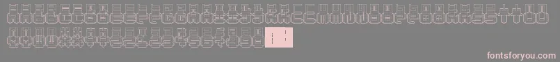 フォントPunchedOut – 灰色の背景にピンクのフォント