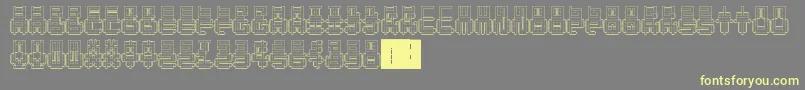 PunchedOut-fontti – keltaiset fontit harmaalla taustalla