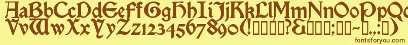 Enchantment Font – Brown Fonts on Yellow Background