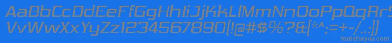 フォントVibrocentricRgIt – 青い背景に灰色の文字