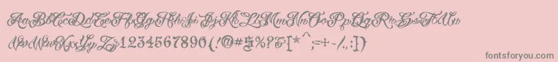 VtcTattooscripttwo-fontti – harmaat kirjasimet vaaleanpunaisella taustalla