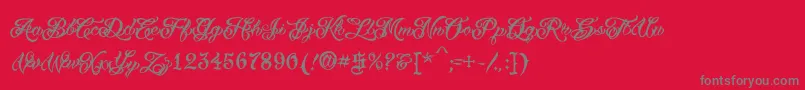 VtcTattooscripttwo-Schriftart – Graue Schriften auf rotem Hintergrund