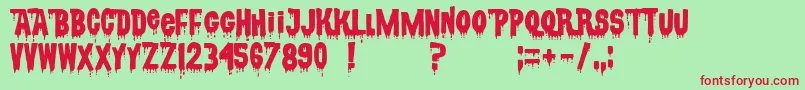 CsnpwdtNfi-Schriftart – Rote Schriften auf grünem Hintergrund