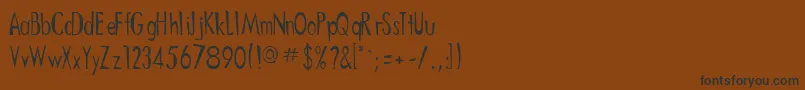フォントOriently – 黒い文字が茶色の背景にあります
