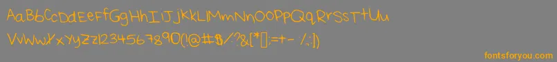 フォントReisHandwritingThin – オレンジの文字は灰色の背景にあります。