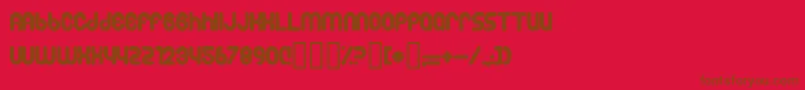 フォントTesh – 赤い背景に茶色の文字