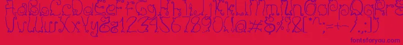 Sendy Font – Purple Fonts on Red Background