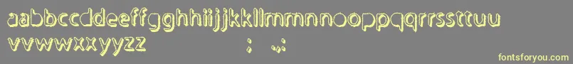 Undertaker Font – Yellow Fonts on Gray Background