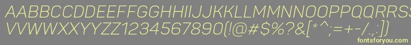 PantonLightitaliccaps-fontti – keltaiset fontit harmaalla taustalla