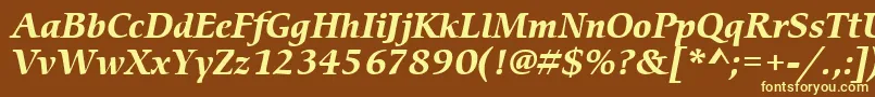 ItcCerigoLtBoldItalic-fontti – keltaiset fontit ruskealla taustalla
