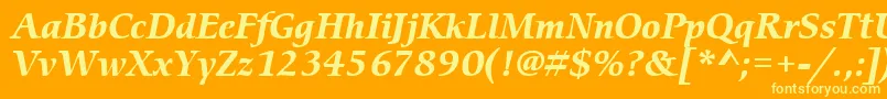 ItcCerigoLtBoldItalic-Schriftart – Gelbe Schriften auf orangefarbenem Hintergrund