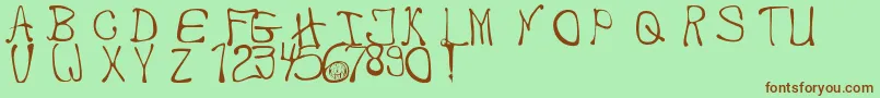 MbThafont Font – Brown Fonts on Green Background