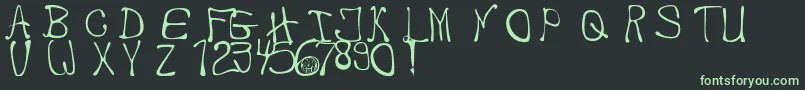 MbThafont Font – Green Fonts on Black Background