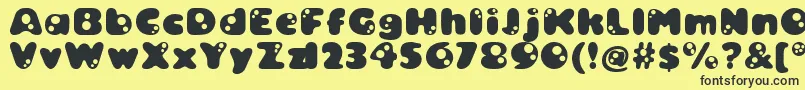 Bambina Font – Black Fonts on Yellow Background