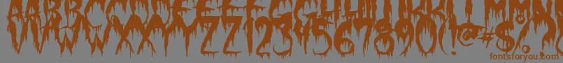 フォントWerewolfMoon – 茶色の文字が灰色の背景にあります。